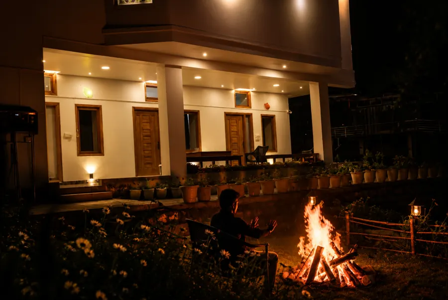 Bonfire at night below the verandah