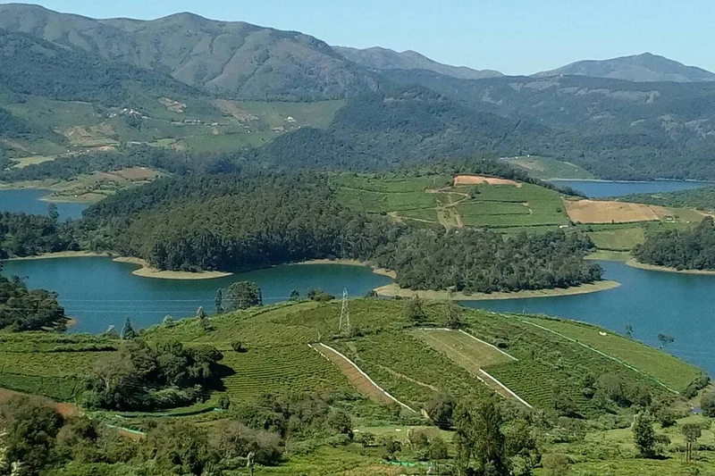 The lake at Avalanche, ringed by hills and tea
