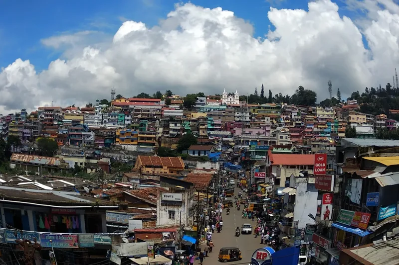Ooty town seen from above, shops crowding the main street