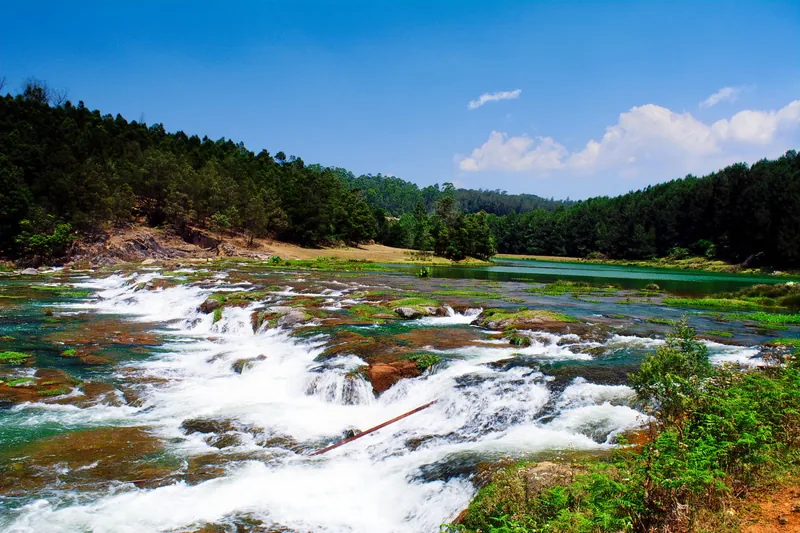 Water running over rocks at Pykara Falls